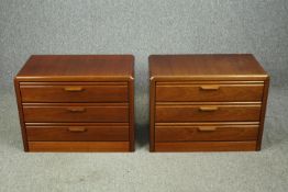 A pair of mid 20th century wooden bedside chests. H.50 W.67 D.39cm.