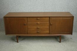 A mid 20th century Scandart teak sideboard. H.72 W.165 D.47cm.