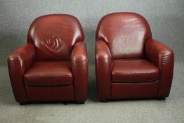 A pair of retro styled leather club chairs. H.90 W.82 D.85cm. (each).