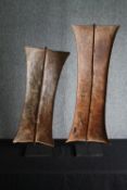 † Two African tribal metal shields, Bakongo people, Congo region. H.95cm. (largest).