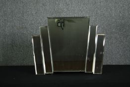 An Art Deco wall mirror. H.48 W.60cm.