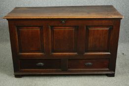 A George II oak mule chest, circa 1750. H.82 W.136 D.57cm.
