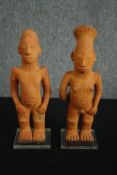 † Two Nigerian terracotta ancestor figures. H.40cm. (each).