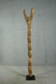 † A carved hardwood granary ladder, 20th century, West African, Dogon tribe. H.213cm.