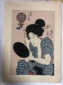 Utagawa Kunisada, Japanese (1786 - 1864), woman applying make up, with artist's seal. Unframed.