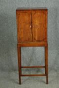 A George III satinwood side cabinet on stand, 19th century. H.123 W.45 D.30cm.