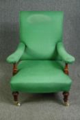 A late Victorian walnut open armchair, with green damask upholstery. H.94cm.