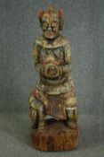† A 19th century Chinese carved and painted figure of a warrior in traditional robes. H.110cm.