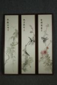 A set of three framed and glazed 20th century Chinese silk embroidery panels depicting birds and