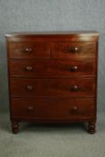 A Victorian bow fronted mahogany chest of drawers. H.124 W.104 D.52cm.
