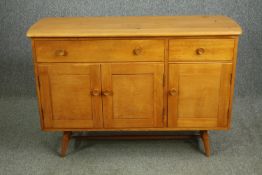 A mid 20th century Ercol blonde elm and beech sideboard model 351, by Lucian Ercolani. H.83 W.123