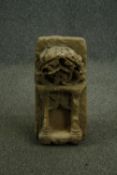 † An early Indian carved stone Hindu shrine. H.47 W.21 D.26cm.