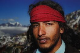 † Simon James, b.1969, Ramhari Sharma, photographic print on canvas. H.90 W.90cm.