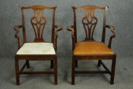 A pair of George III style oak armchairs, 19th century.