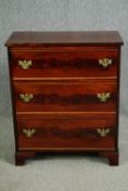A George III style figured mahogany chest (adapted). H.95 W.75 D.39cm.