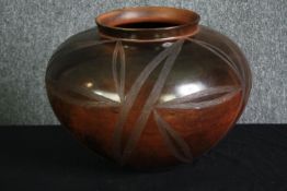 TR10797 † Ian Garrett, South African, (b.1971), a large burnished terracotta vase with stylised