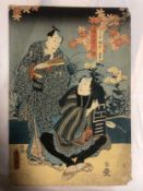 A 19th century unframed Japanese woodblock print of two Kabuki actors, with artist's seal.