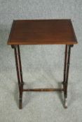 An Edwardian mahogany side table, formerly part of a quartetto nest of tables. H.71 W.49 D.40cm.