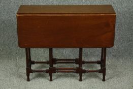 An Edwardian mahogany 'spider leg' drop leaf occasional table. H.61 W.75 D.76cm.