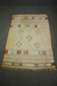 A mid 20th century Indian Dhurrie rug L.143 W.100cm.