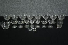 A set of eight Stuart Crystal Stratford 'beehive' wine glasses, four matching sherry glasses and a
