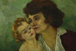 A mid 20th century oil on canvas, mother and child, indistinctly signed. H.39 W.36cm.