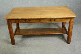 A 20th century oak farmhouse style dining table. H.73 W.151 D.81cm.