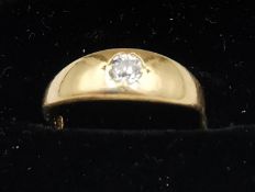 A Victorian 18ct yellow gold and old mine diamond ring. Set with a round old mine diamond with an