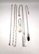 A collection of silver jewellery to include a fully hallmarked ingot, beaded chain, silver dog