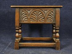 A 17th century style oak stool, 19th century, converted with a later hinged lid.