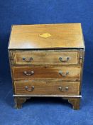 A George III style mahogany and inlaid bureau, circa 1900. H.96 W.76 D.38cm