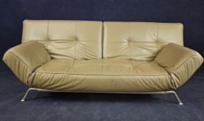 A Ligne Roset Smala beige leather upholstered sofa bed. H.90 W.230 D.110cm