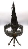 An early 20th century white metal (tests as silver) Batavian crown with pierced design.