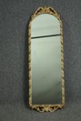 An Italian carved painted and parcel gilt pier mirror H.105 W.34cm.