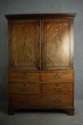 A George III mahogany linen press, circa 1770. H.180 W.120 D.60cm.