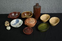 Kitchenalia, a group of stoneware dishes and other items. H.25cm.(largest).