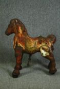 A mid 20th century vintage painted metal Mobo Bronco horse. H.76 W.72cm.