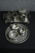 A vintage Art Deco hammered pewter tea set of hexagonal form, together with another circular part