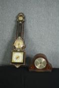 A mid 20th century continental inlaid barometer and an oak mantel clock. L.89cm. (largest).