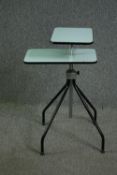 A mid 20th century composite laminate topped two tier stand. H.113 W.50 D.40cm.