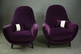 A pair of contemporary designer armchairs. H.106cm. (each).