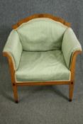 A 19th century continental Biedermeier style satinbirch armchair. H.78cm.