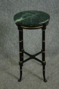 A French Empire style ebonised and parcel gilt jardiniere stand with a verde antico marble top. H.69