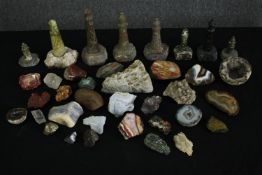 A large collection of agate specimens and lighthouse sculptures. H.18cm. (largest).