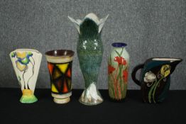 A group of four Art Deco and later earthenware vases and a jug, of various forms and glazes,