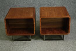 A pair of mid 20th century style teak bedside tables on chrome supports. H.48 W.50 D.50cm. (each).