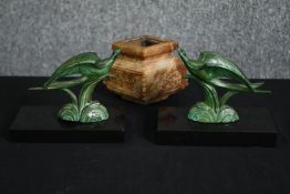 A pair of Art Deco cold painted bronze figures in the form of gulls on black marble bases together