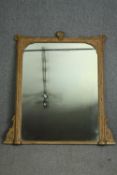 Overmantel mirror, 19th carved giltwood and gesso. H.121 W.101cm. (Finial detached as shown).