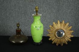 A suburst giltwood mirror, a Chinese porcelain table lamp (converted) with a lime green glaze, and