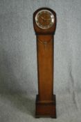 A mid century oak cased grandmother clock by Smith's. H.132 W.25 D.18cm.